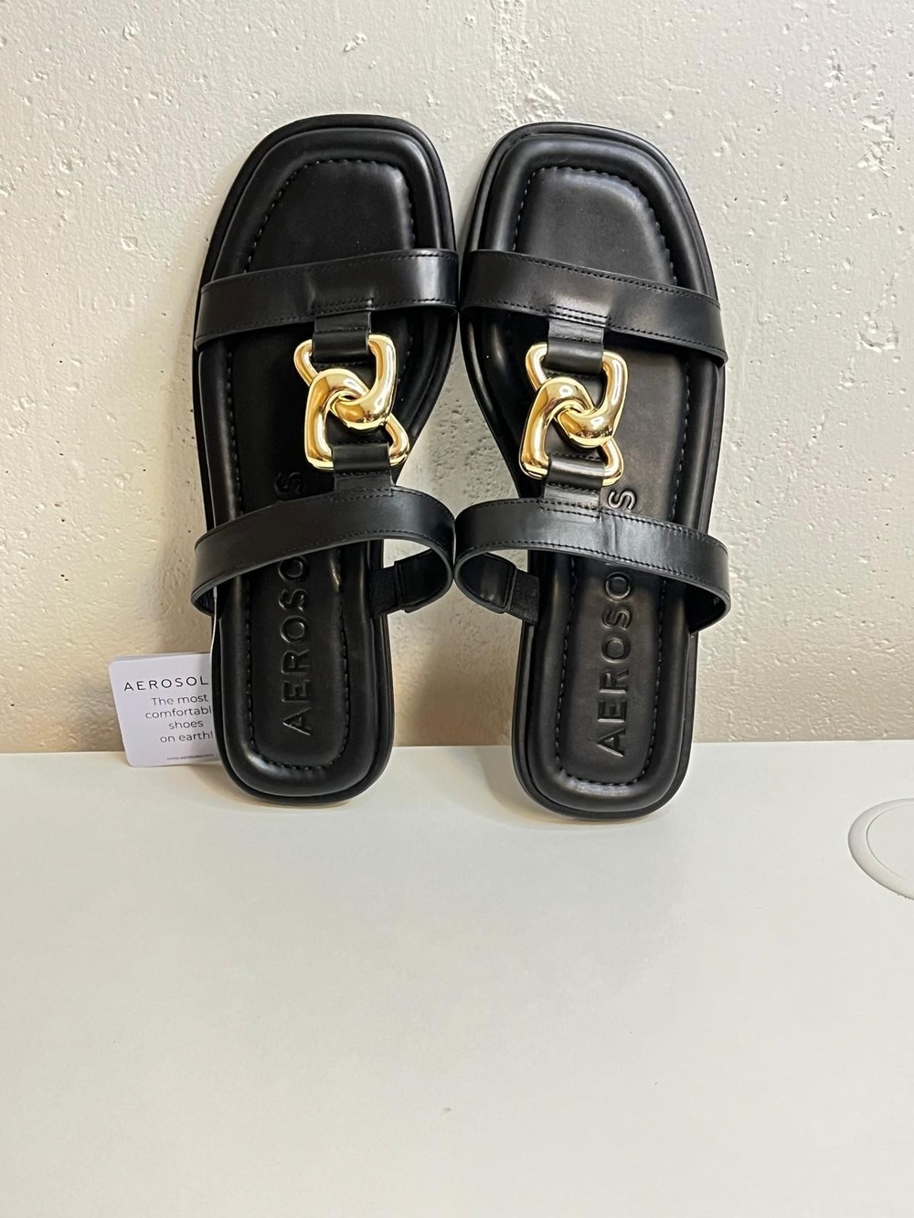 AEROSOLES Black Slide Sandals with Gold Chain Detail